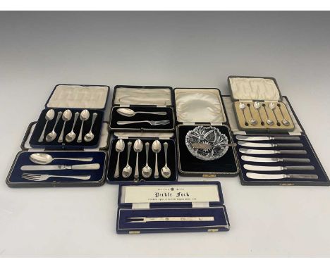 A group of eight cased flatware items, to include an Elizabeth II replica silver pickle fork, together with two cased sets of