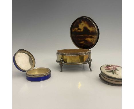 A twentieth-century Continental silver and enamel compact, of globular form, the cover decorated with guilloche enamel in roy