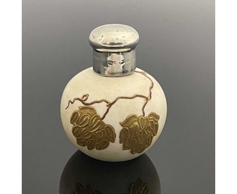 A Victorian ceramic perfume bottle, the blush ivory body decorated with hops in polychrome enamel and raised gilding, the und