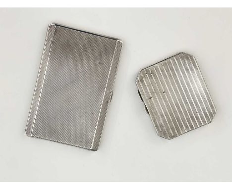 An Edward VII Art Deco silver cigarette case, of rectangular form with canted corners, the exterior decorated with engine tur