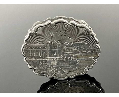 Scarborough Interest.A Victorian silver castle top vinaigrette, of shaped oval form, the top engraved with a scene of the Sal