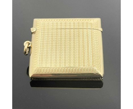 A George V 9ct gold vesta case, of rectangular form, the exterior decorated with engine-turning, the base with integral strik