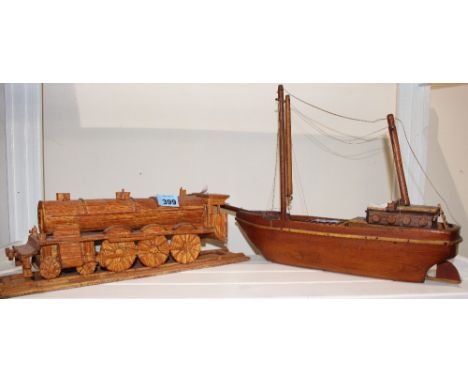 		A matchwork locomotive and a model of a boat