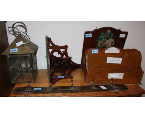 		A brass hall lantern, two stationary racks, fret carved corner shelf and coat hooks