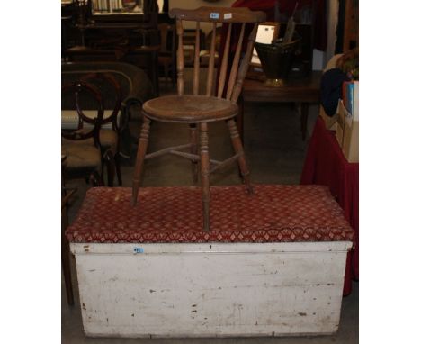 		A painted pine seaman's trunk and a stickback kitchen chair