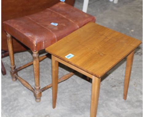 		A leather topped stool and an occasional table