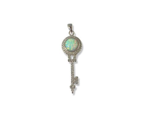 Silver, Opal and white stone key design pendant weighing 4.34 grams measuring 4cm in length 