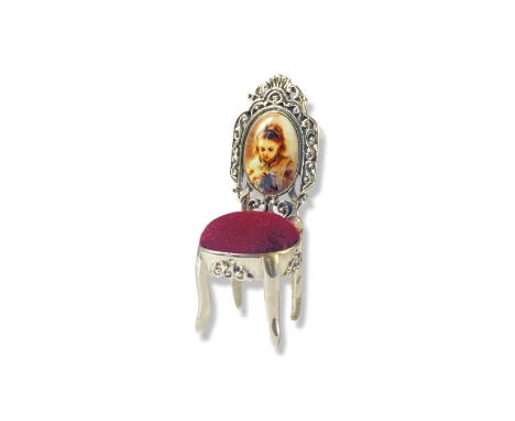 Silver and enamel pincushion in the design of a chair weighing 10.16 grams measuring 4.5cm in height