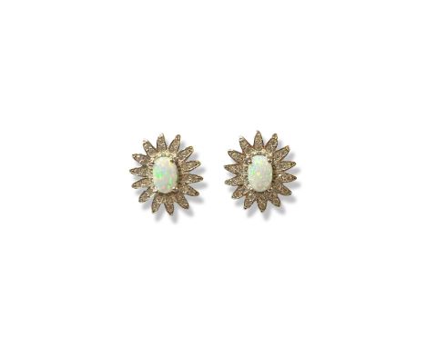 Pair of silver, Opal and white stone fancy design stud earrings weighing 2.76 grams 