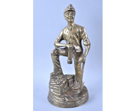 An Early/Mid 20th Century Brass Figure of Coal Miner with Lamp and Pickaxe, 27.5cm high 