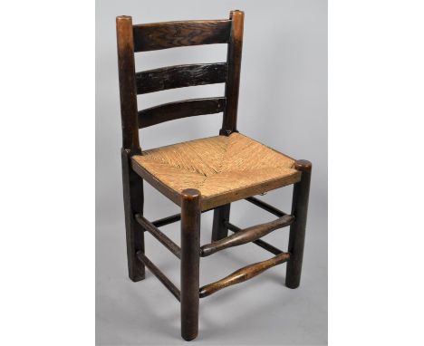 A 19th Century Rush Seated Ladder Back chair 