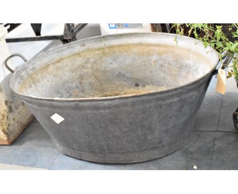 A Vintage Galvanised Tin Bath with Two Carrying Handles, 64cm wide 