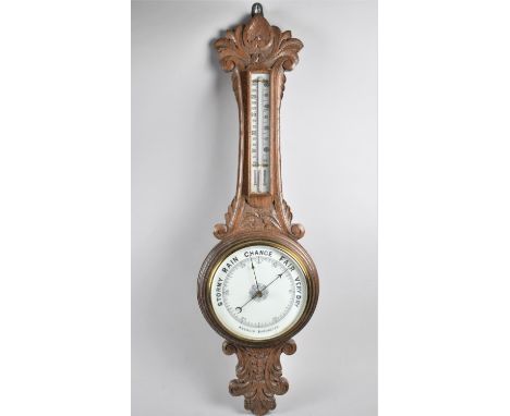 A Late Victorian Oak Cased Aneroid Wheel Barometer with Thermometer 