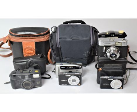 A Collection of Various Vintage Cameras and Photographic Equipment 