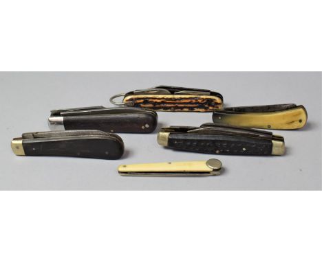A Collection of Six Various Pocket Knives to Include Lambs Foot and Horn, Calf Foot, Wooden Multitool and Pipe Cleaner 