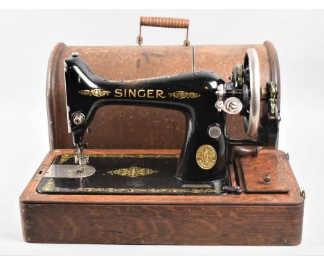 A Vintage Oak Cased Singer Sewing Machine 