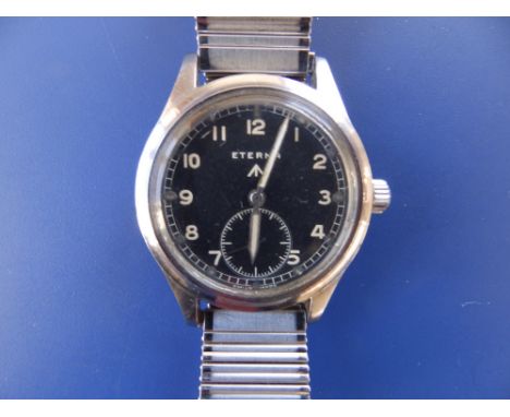 A gent's stainless steel WWII military issue Eterna black dial 'Dirty Dozen' wrist watch with subsidiary seconds with replace