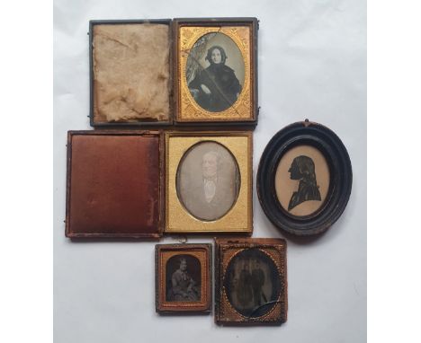 Four early  photographs and a silhouette, including a daguerrotype male portrait, 5" x 4.25" and an ambrotype female portrait