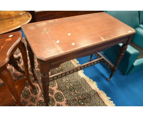 A Victorian mahogany side table, having bobbin turned supports. Width approx 100cm.