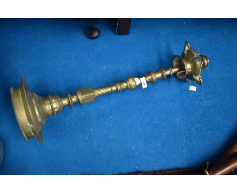 An eastern brass candlestick/smokers stand, height approx 64cm.