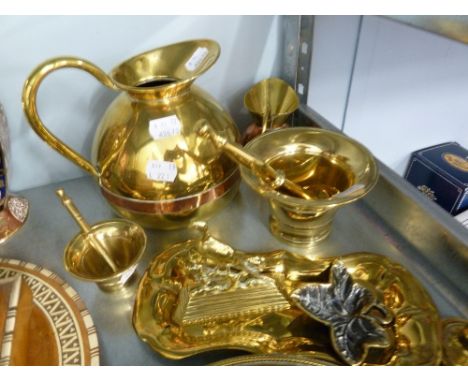 TWO BRASS PESTLES AND MORTARS, TWO BRASS AND COPPER JUGS, A BRASS SNUFFERS TRAY, A BRASS CIRCULAR DISH, A BRASS ASHTRAY AND '