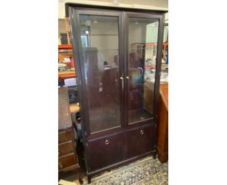 4 Door glass display cabinet with single glass shelf, approximate measurements:  height 71 inches, Width 35.5 inches, Depth 1