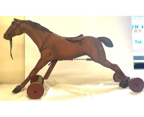 Vintage ride on mechanical horse, approximate height 21 inches, length 37 inches 