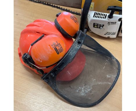 Gasoline 52 CC chainsaw with safety helmet and ear defenders, working order 