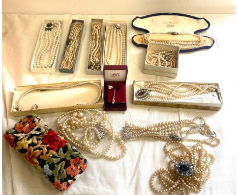 Large selection of pearl necklaces etc 
