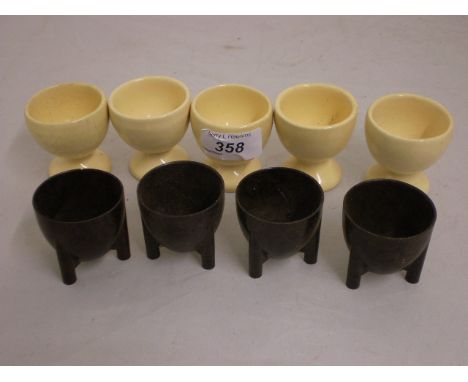 4 SPACE SHUTTLE BAKELITE EGG CUPS WITH 5 OTHER CERAMIC EGG CUPS  