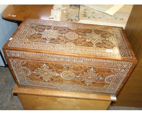 CARVED WOODEN TRUNK WITH MOTHER PEARL INLAY