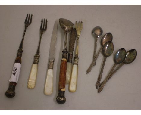 4 VINTAGE PLATED ITEMS WITH MOTHER OF PEARL HANDLES PLUS 7 OTHER PLATED PIECES OF CUTLERY