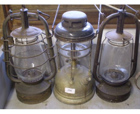 3 VINTAGE LANTERNS IN WROUGHT IRON STANDS CONVERTED TO ELECTRICITY PLUS HANGERS 