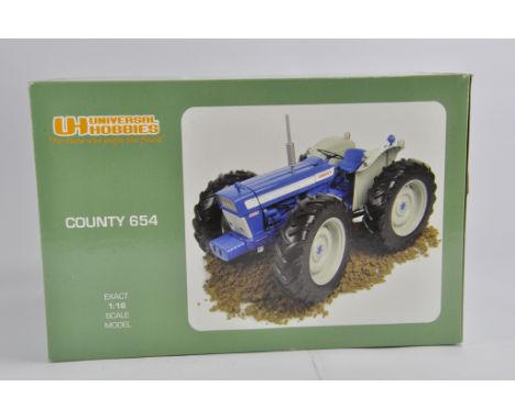Universal Hobbies 1/16 County 654 Tractor. M in E Box.