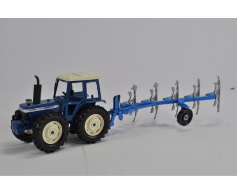 Britains Based 1/32 County 1474 Tractor with Plough. E. 