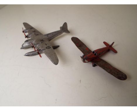 Dinky Toys - a Seaplane G-AVKW, cast silver body with four twin-blade red propellers, and a Dinky light Tourer Aieroplane, re