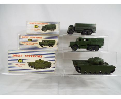 Dinky Toys - a lot comprising three boxed Dinky military vehicles to include #622 Ten Ton Army truck in military green with d