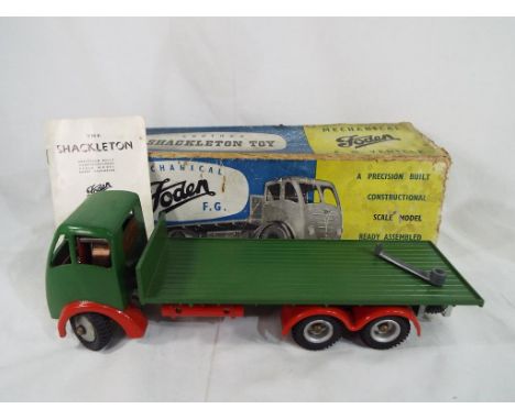 Shackleton Models - a Shackleton Models Foden FG6 flat bed lorry, green cab and flat bed, red chassis with instructions and c