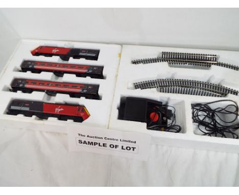 Model railways - a Hornby OO gauge Virgin Trains 125 boxed set # R1023 and a wooden base board 122 cm x 180 cm with applied t