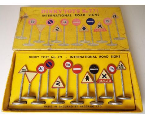 Dinky Toys - International Road Signs # 771, set of twelve signs in original yellow box with inner card - Est £30 - £50