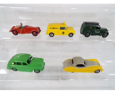 Dinky - a collection of diecast model motor vehicles by Dinky to include a Jaguar model No. 157, a Vanguard, MG Midget 108, a