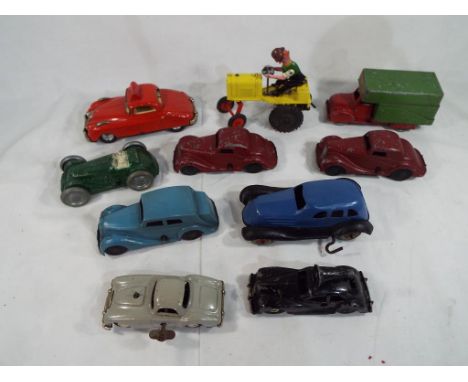 A quantity of ten model motor vehicles predominantly clockwork or wind-up mechanisms