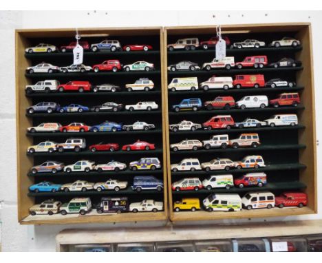 Diecast Models - two wall mounted display shelves containing a collection of approx 69 predominantly emergency service vehicl