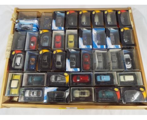 Diecast - a collection of 38 diecast model motor vehicles by Cararma, models in 1:72 scale, all models appear mint in origina