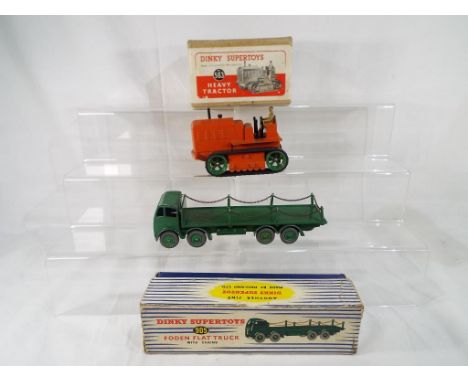 Dinky Toys - Dinky toy #905 Foden flat truck with chains in green with green hubs, spare wheel and hook, model appears very g