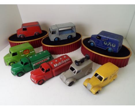 Dinky Toys - Trojan Vans, 454 'Cydrax', light green body and hubs, 31d 'Oxo' dark blue body, mid-blue hubs, a further van, re