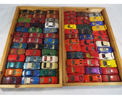 Diecast Models - two wooden trays containing approx 75 diecast model motor vehicles to include a collection of  Ferraris, Jag