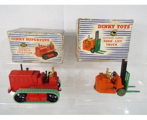 Dinky Toys - a Dinky fork lift truck model No. 401 in excellent condition, with a fair condition box and a Dinky Supertoy Bla