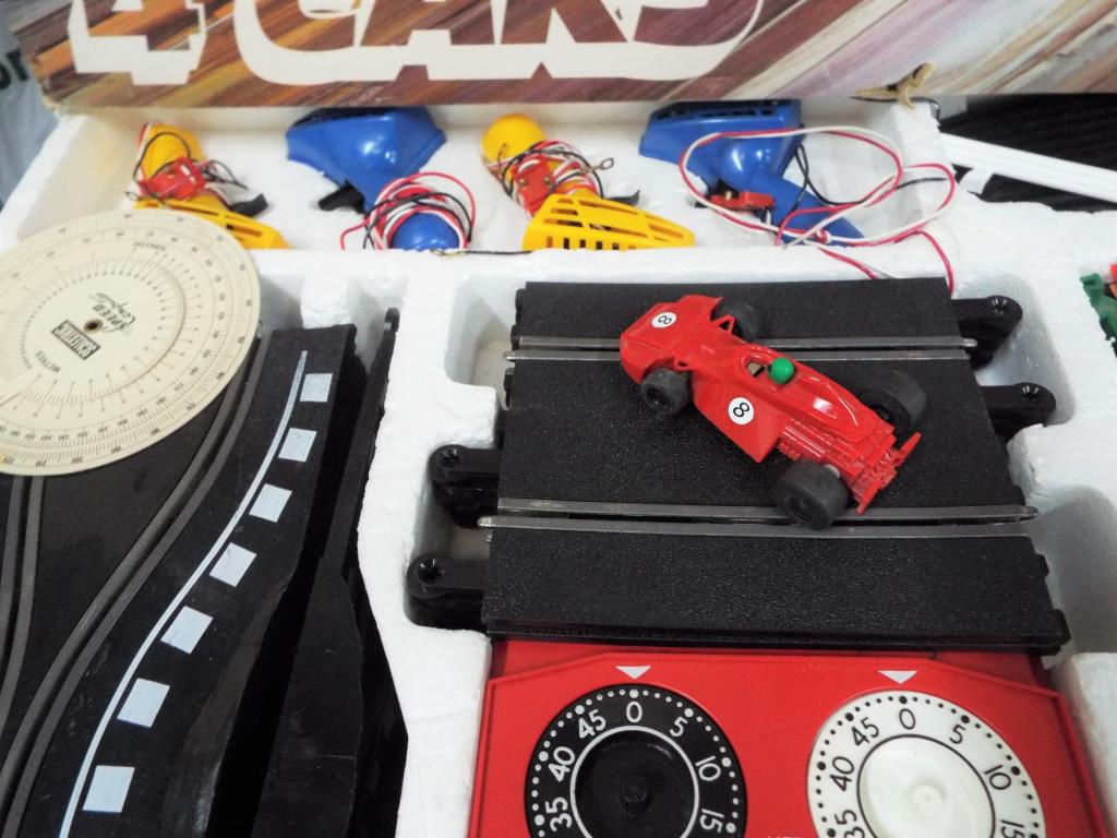Scalextric 600 Four Lane electric model racing set with four cars
