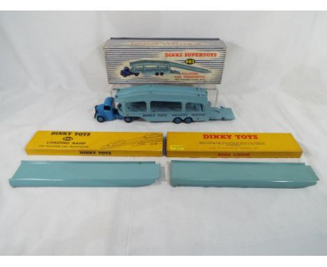 Dinky Toys - a boxed Dinky #982 Pullmore Car Transporter mid-blue cab and hubs light blue back and decks together with two bo